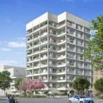 Investissement loi Pinel Rennes avec ce grand immeuble blanc arboré, vue sur rue